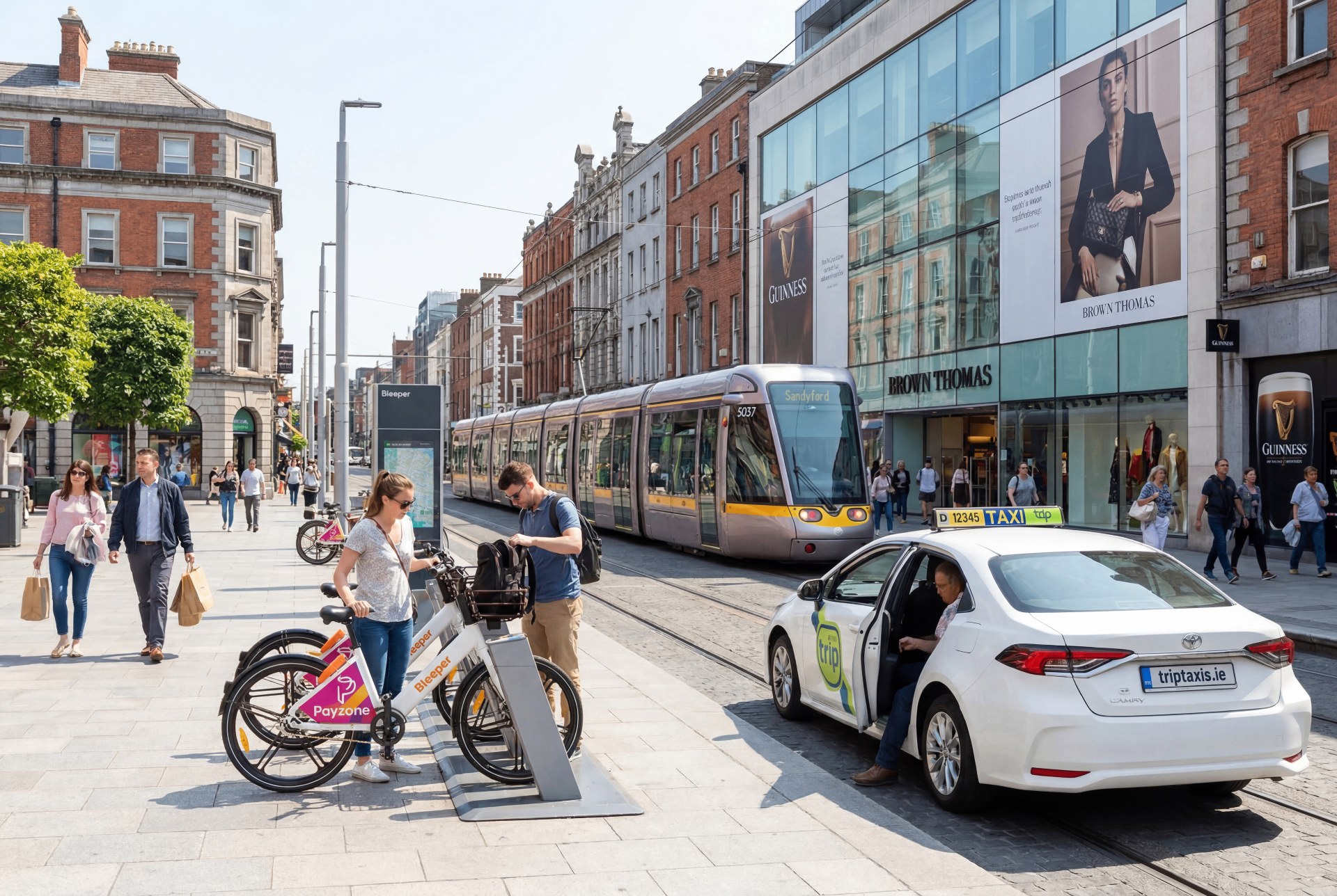 A traveller checking a mobility app at a tram stop beside a bike-share station at dusk